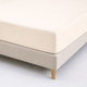 Drap housse percale Crème posé sur un lit avec son sommier vue de haut - Ecolinge