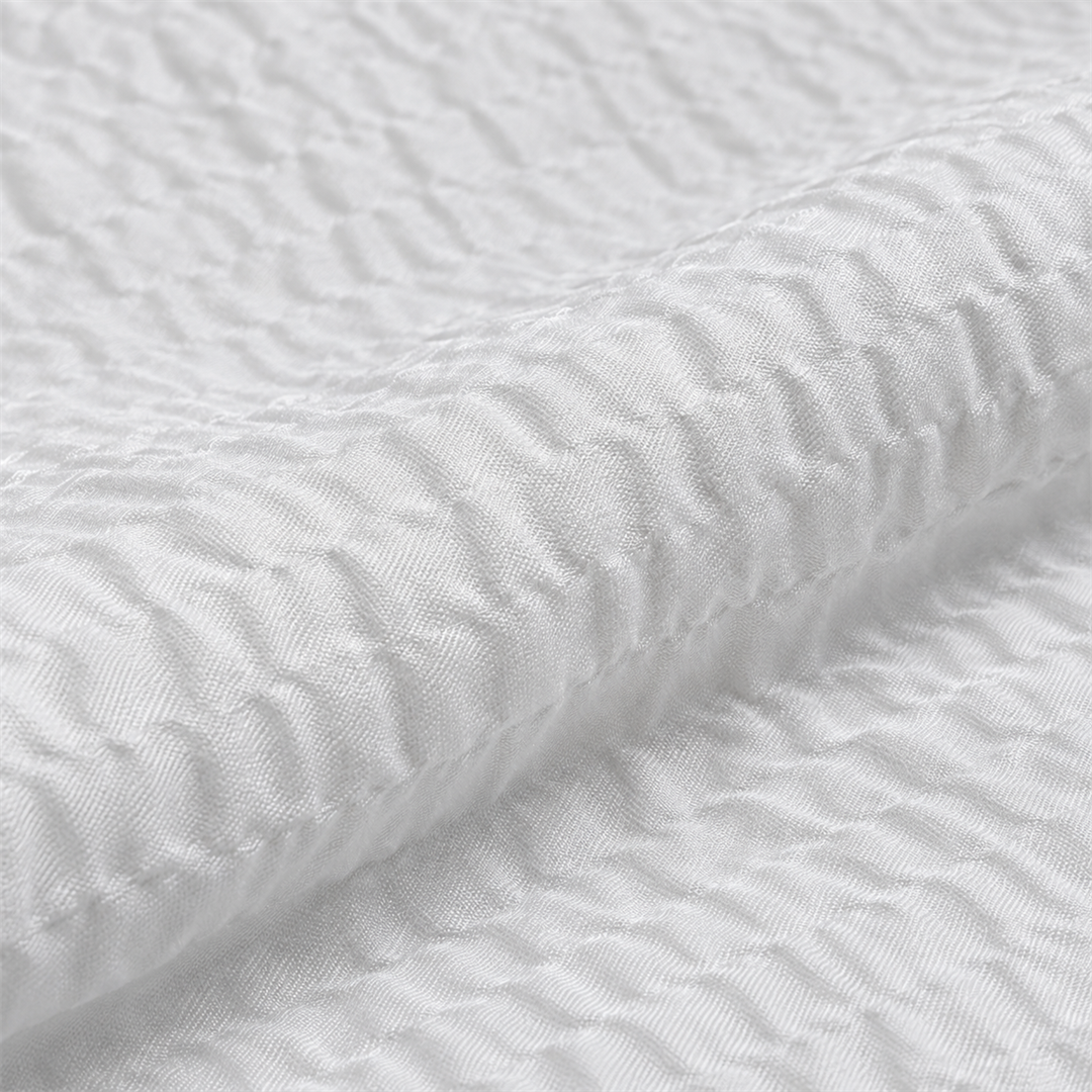 Détail du tissu gaufré de la housse de couette Zen